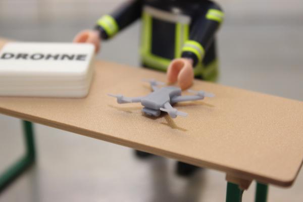 Drohne mit Kiste